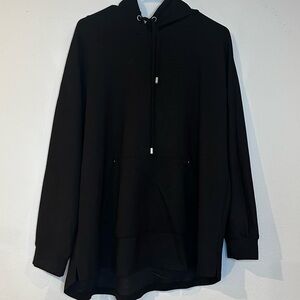 MAGASCHONI brand hooded black sweatshirt with drawstring in a woman’s size 1X.